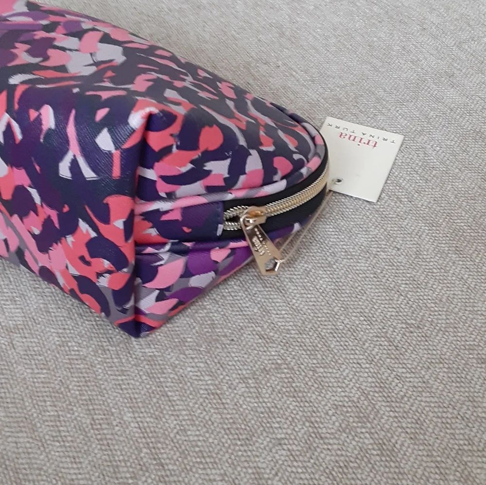 Trina Turk multi color print leather makeup bag